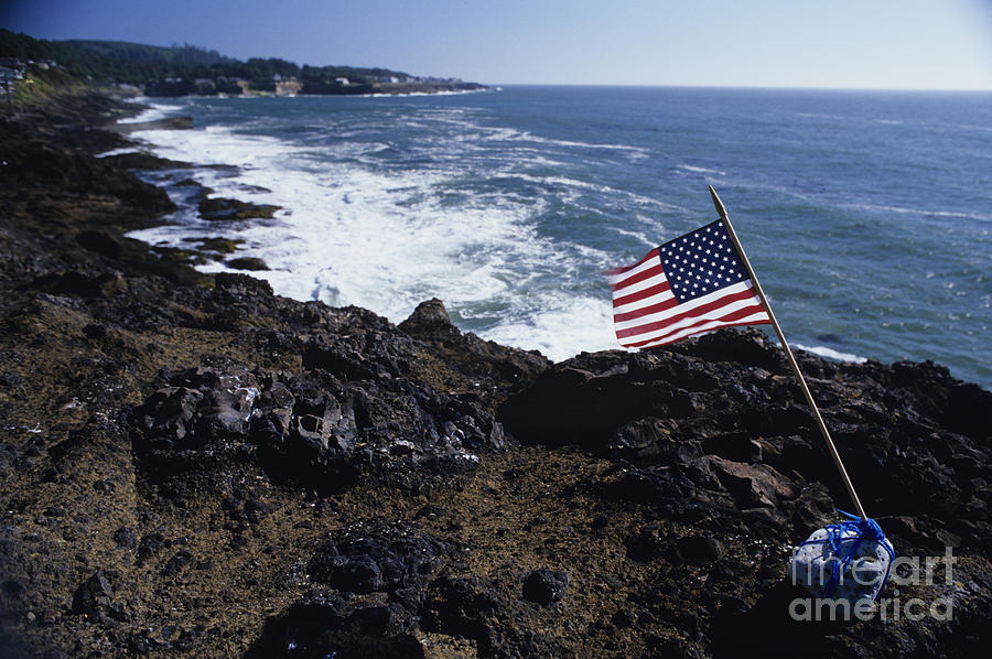 Flag along Coastline Photograph by Jim Corwin