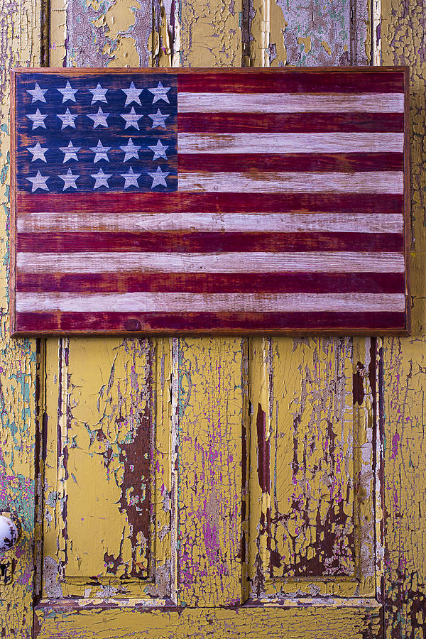 Flag On Old Yellow Door Photograph by Garry Gay