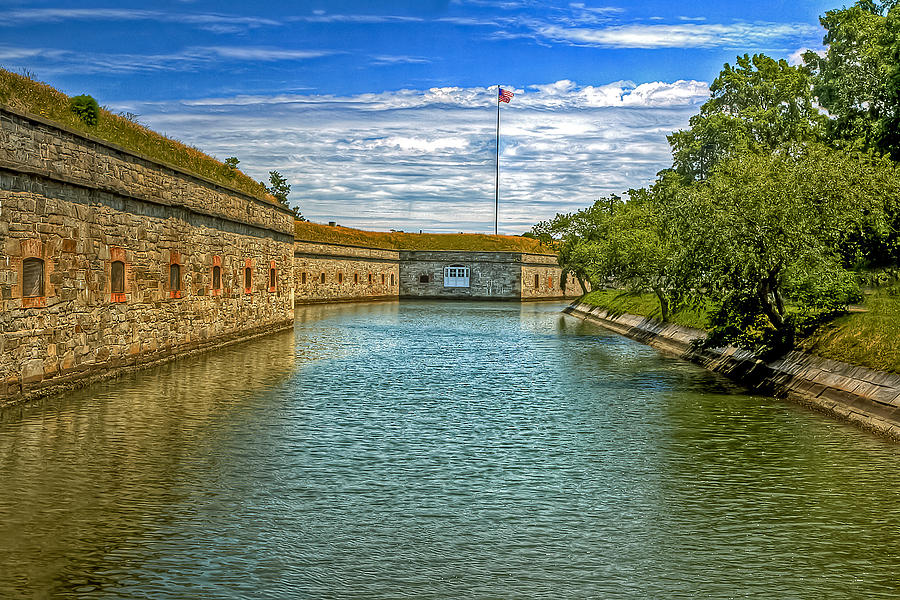Flag Over the Moat Photograph by Jerry Gammon