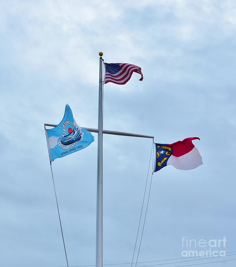 Flags At Carolina Beach NC Photograph by Bob Sample