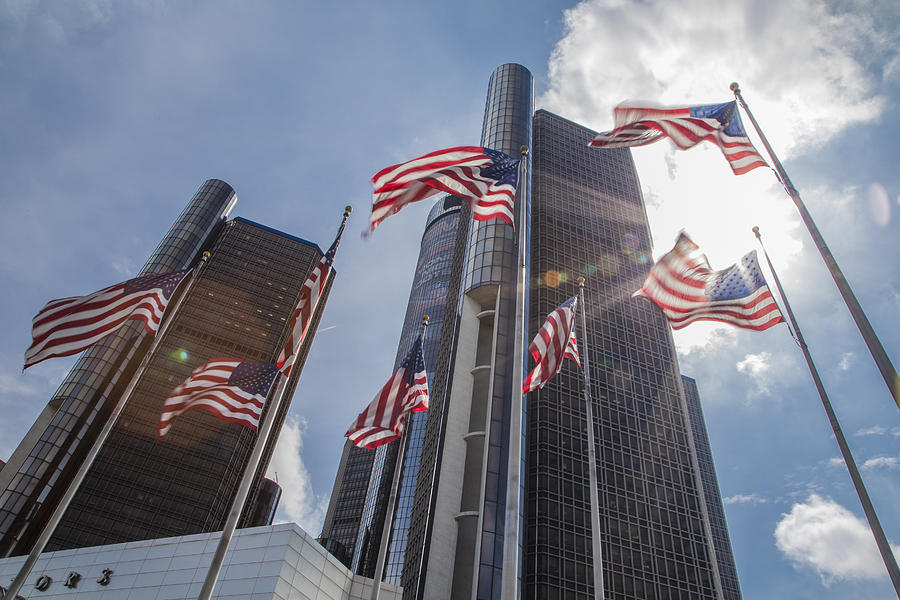 Flags at Renaissance Center in Detroit  Photograph by John McGraw