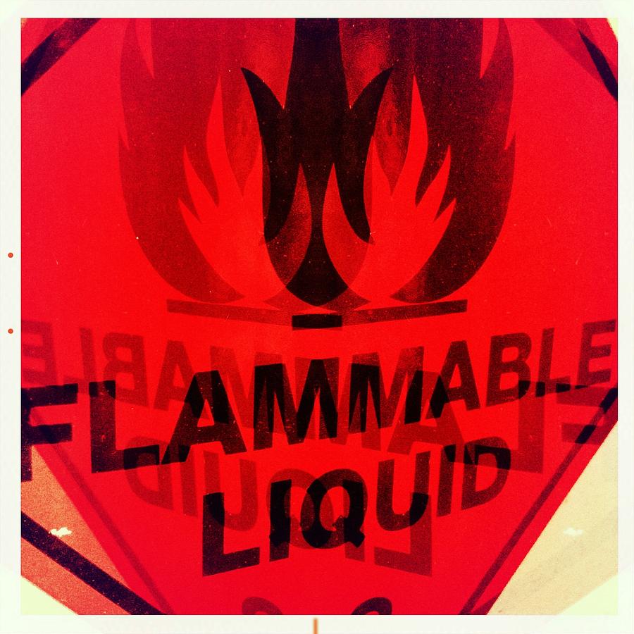 Flammable Liquid Photograph by Marco Oliveira