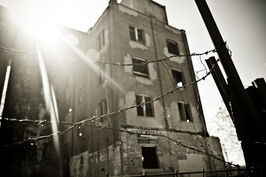 Flare Behind the Wire Photograph by Melinda Ledsome