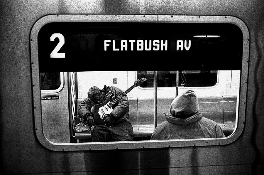 Playing the Blues on the No. 2 to Flatbush Ave Photograph by Doc Braham