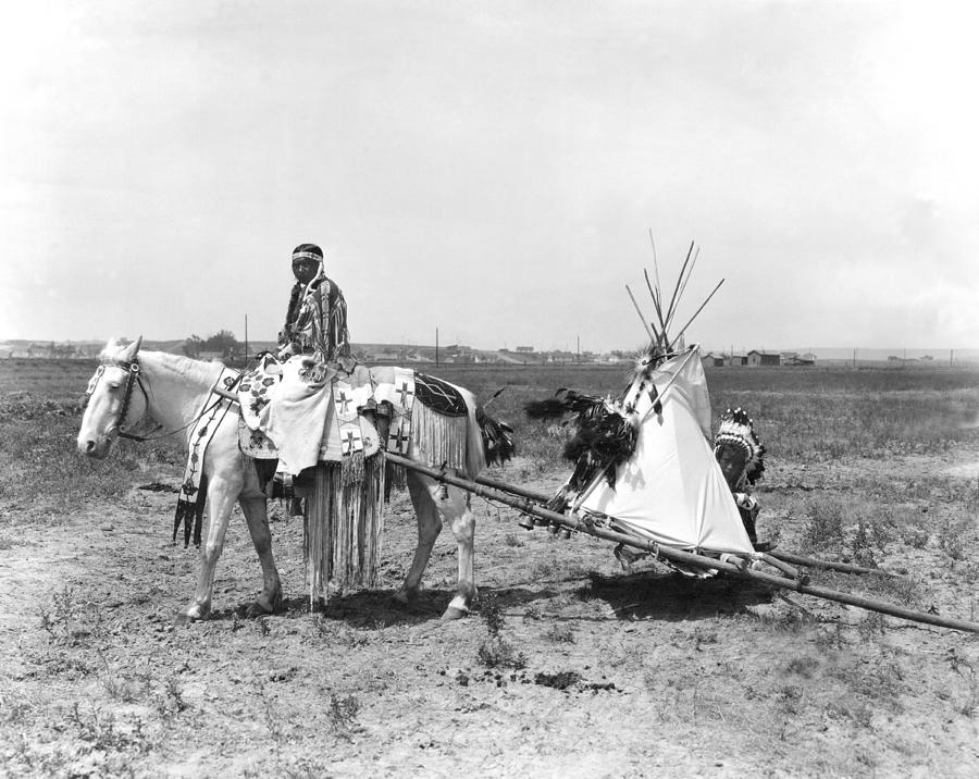 Native American Photograph - Flathead Woman Uses Travois by Underwood Archives