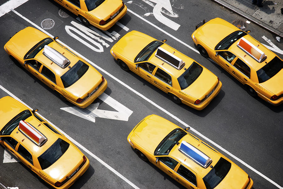 Fleet of Yellow New York City Taxi Cabs from Above Photograph by PeskyMonkey