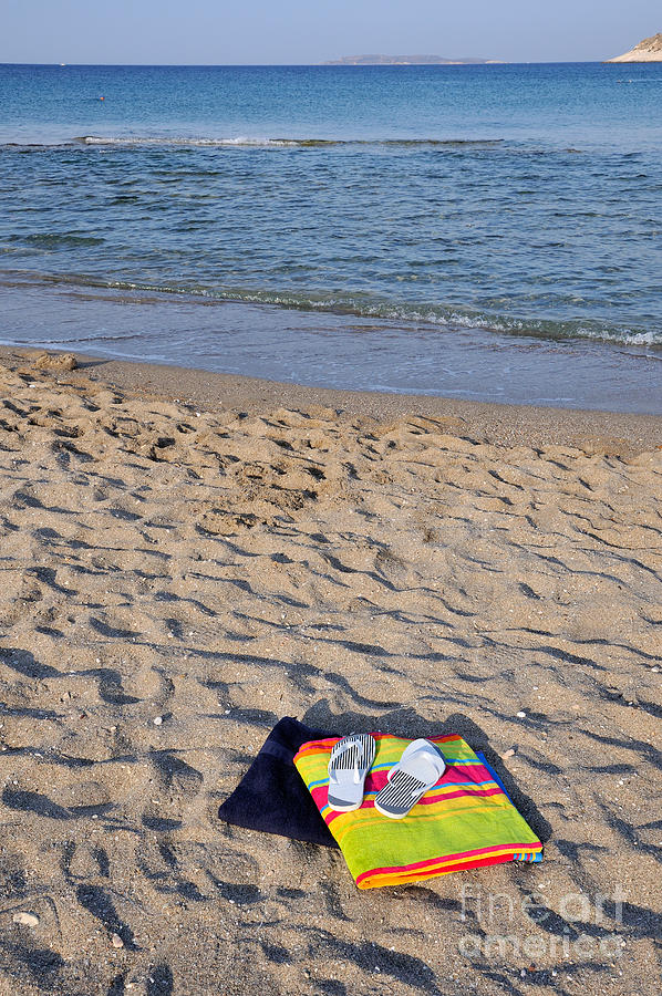 Summer Photograph - Flip flops and towels on beach by George Atsametakis