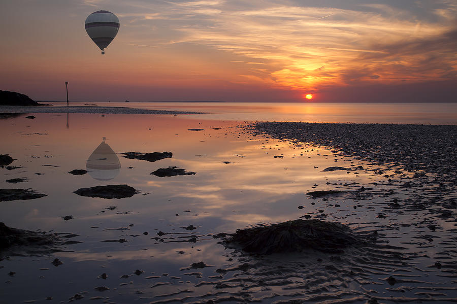 Sunset Photograph - Floating at Sunset by Nigel Jones