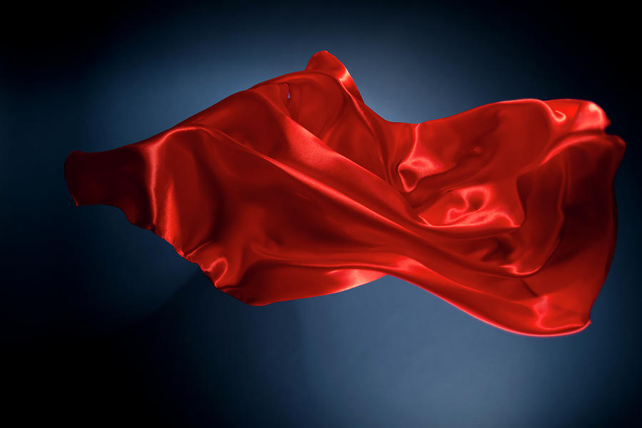 Floating Red Silk On A Dark Blue Photograph by Gm Stock Films
