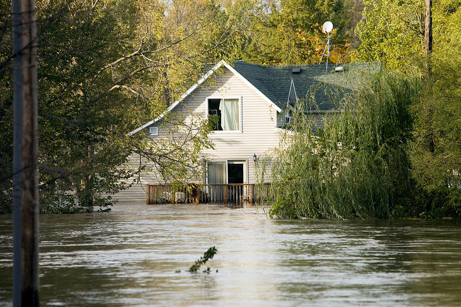 Flooded House, Following a Severe Rainstorm Photograph by BanksPhotos