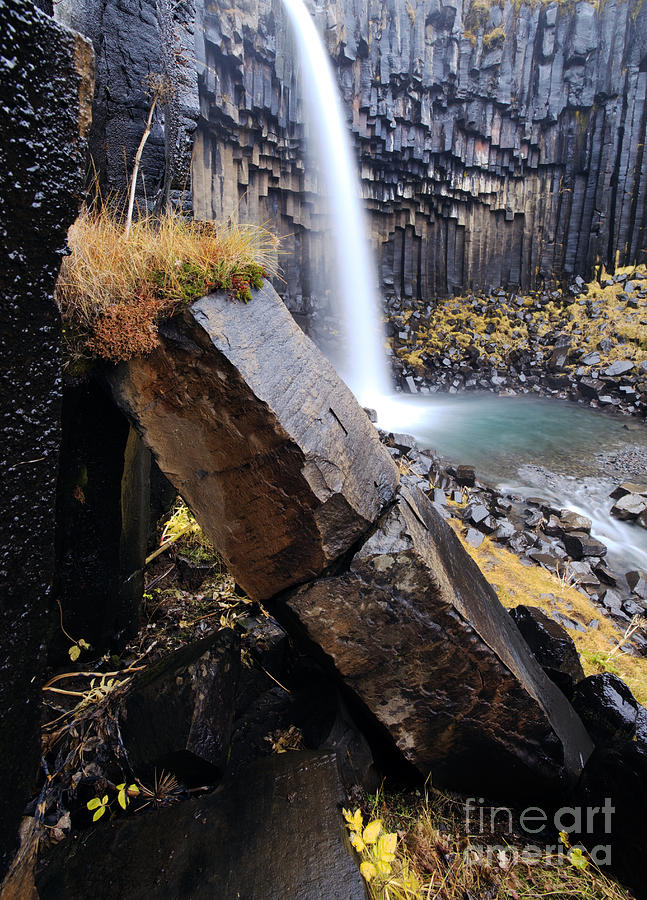 Flowing through basalt rocks Photograph by Matteo Colombo