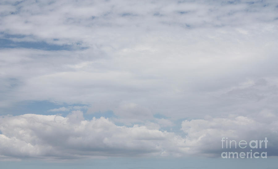 Fluffy Clouds Over Jones Beach Photograph by John Telfer