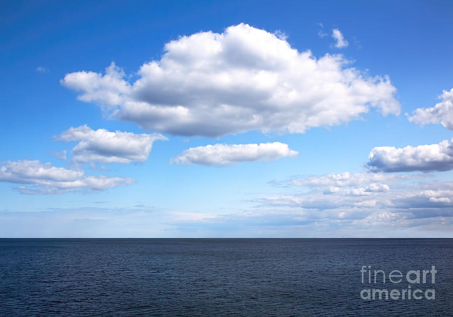Fluffy Clouds Over Open Water Photograph by Barbara McMahon
