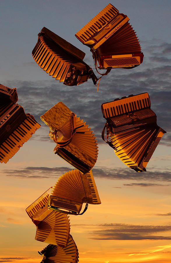 Sunset Photograph - Flying Accordian at Sunset by Gary Horsfall