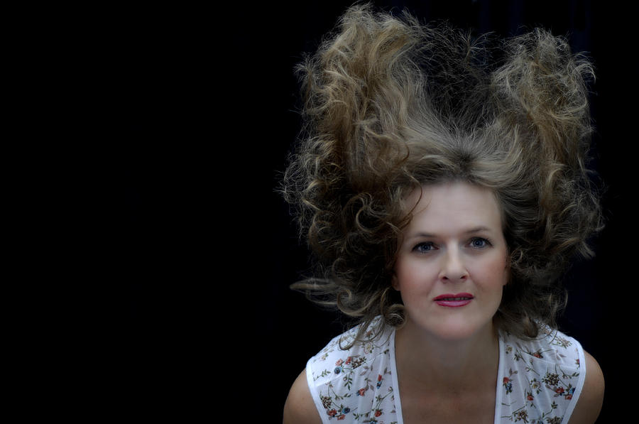 Flying Hair Photograph by Donna Blackhall