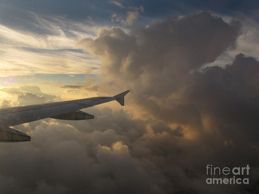 Flying in the Clouds Photograph by Inge Riis McDonald