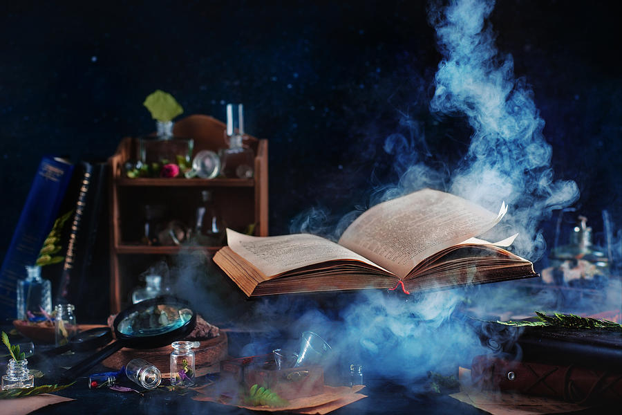 Flying magical book with smoke Photograph by Dina Belenko Photography