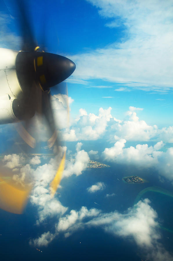 Flying over Maldivian Archipelago Photograph by Jenny Rainbow