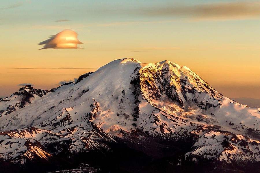 Flying over Rainier Photograph by Mike Centioli