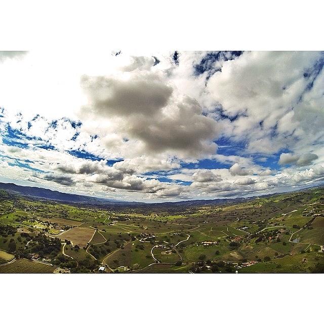 Dronefly Photograph - Flying Up In The Clouds! #djiphantom by Logan Deats