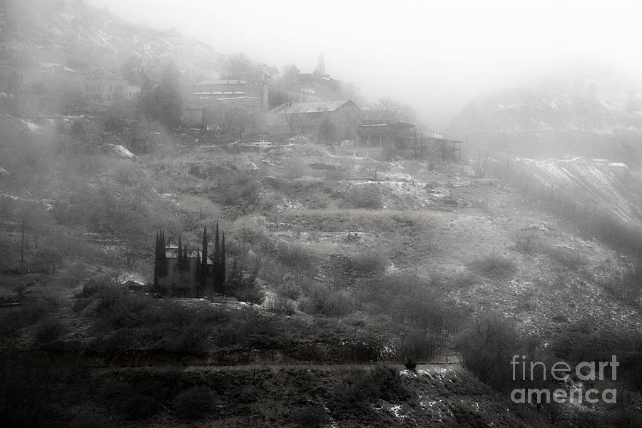 Fog and Snow with Powderbox Church in Jerome AZ Photograph by Ron Chilston