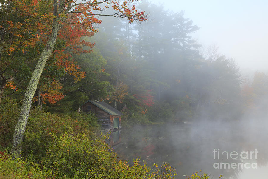 Foggy autumn morning and lake boathouse Photograph by Ken Brown