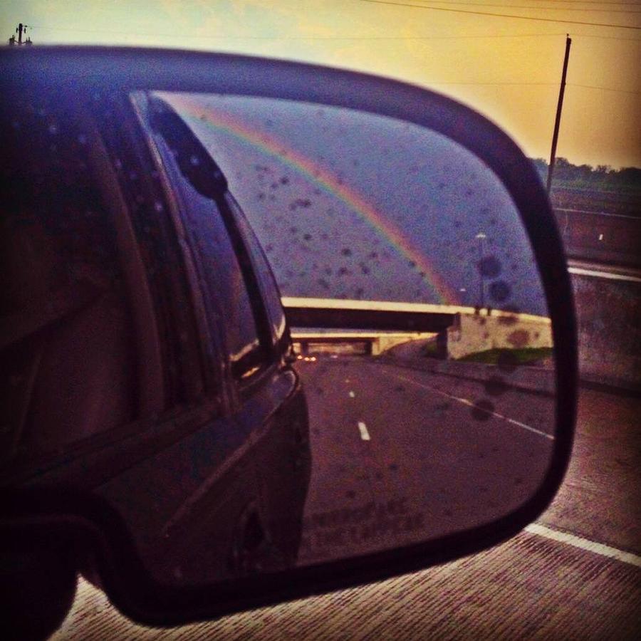 Followed by a Rainbow Photograph by Lora Mercado