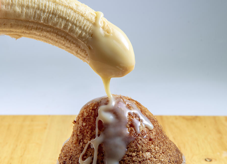 Food humor: Banana, muffin and sugared milk Photograph by Miguelangelortega