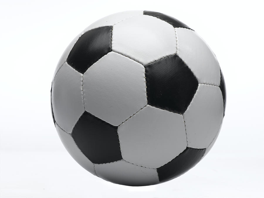Football against white background, close-up Photograph by Lazi & Mellenthin
