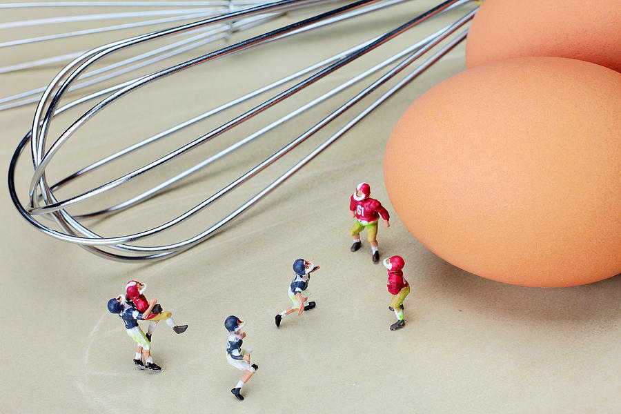 Football match among eggs miniature art Painting by Paul Ge