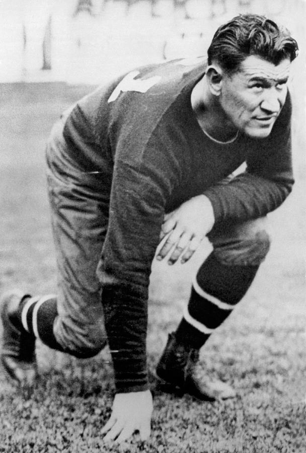 Black And White Photograph - Football Player Jim Thorpe by Underwood Archives
