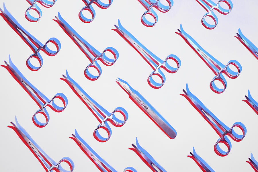 Forceps and a scalpel in pattern Photograph by Bjarte Rettedal