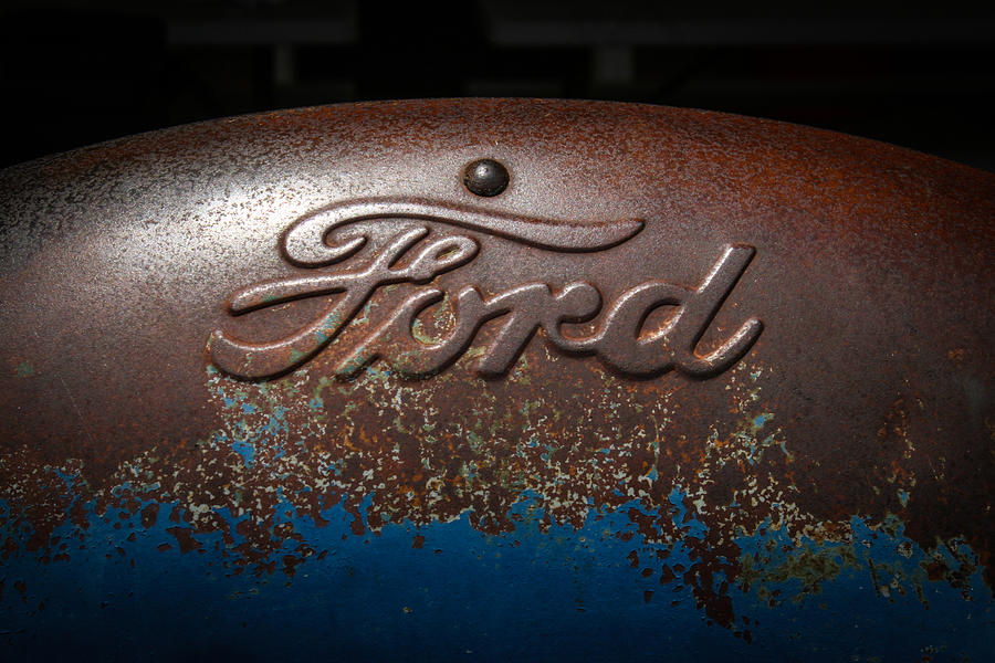 Ford Tractor Logo Photograph by Jeff Mize
