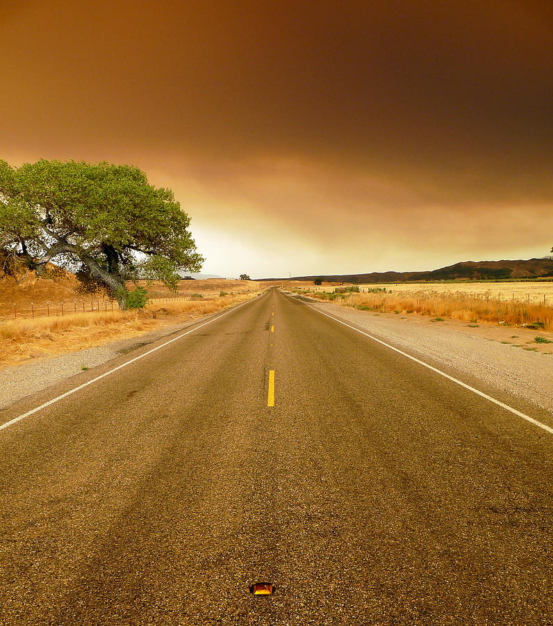 Forest Fire Smoke Over Deserted Road Photograph by Jeff Lowe