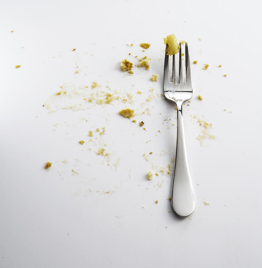 Fork with crumbs of apple pie Photograph by Manny Rodriguez