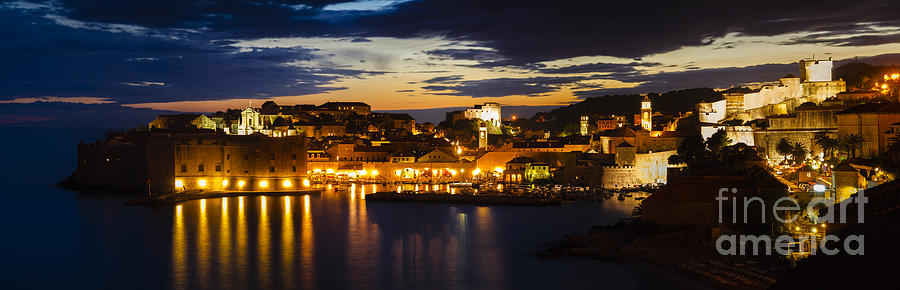 Fortefied medieval city of Dubrovnik Croatia at dusk Photograph by Oscar Gutierrez