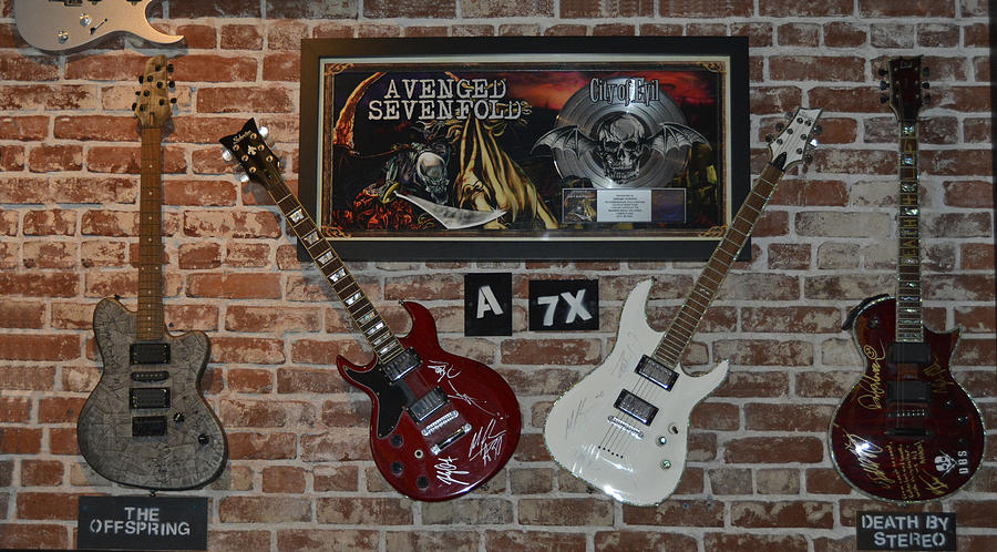 Vintage Four autographed Guitars and signed record from bands Avenged SevenFold- The Off Spring  Photograph by Renee Anderson