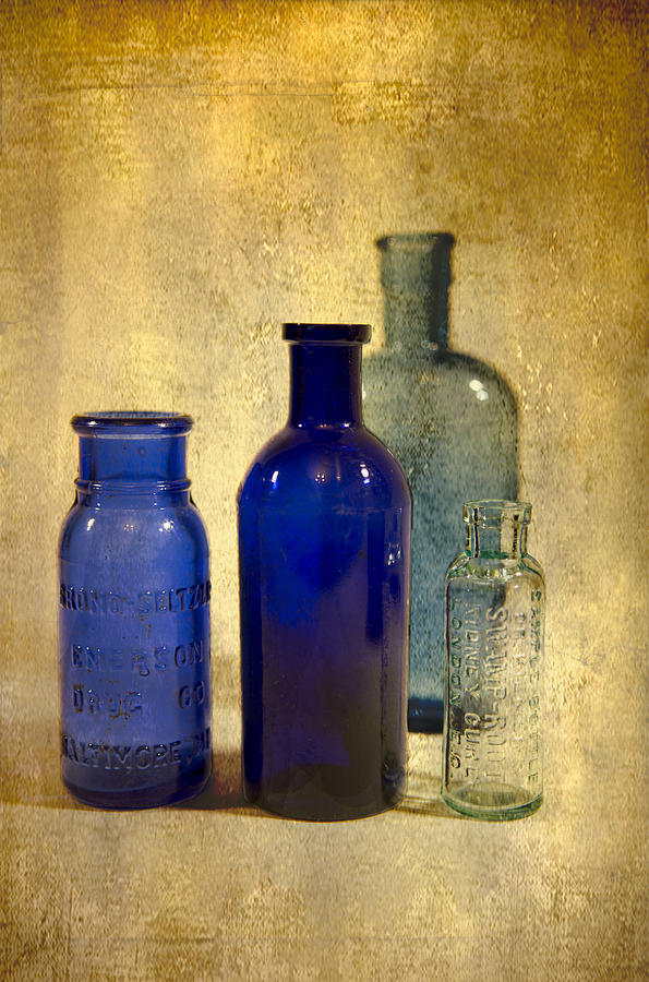 Bottle Photograph - Four bottles by Peter Chadwick