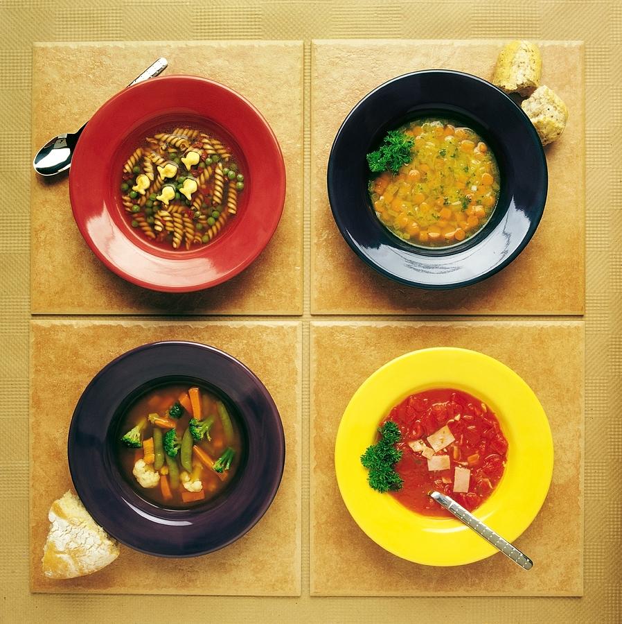 Bowl Photograph - Four Dishes Of Different Food by Ron Nickel