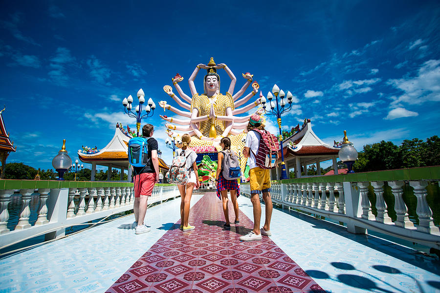 Four friends exploring Thailand Photograph by Itsskin