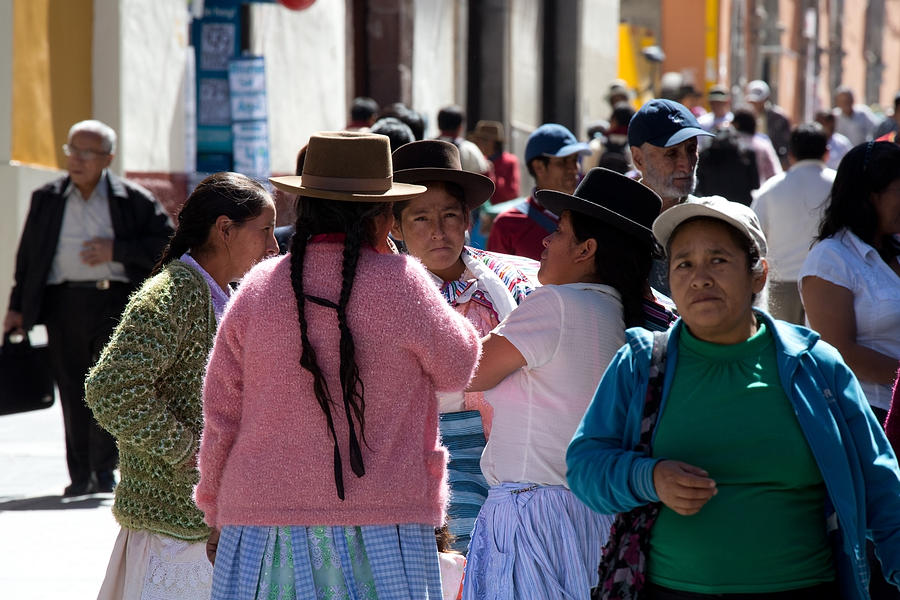 Four indian women conversing in Huamanga, Peru Photograph by BirgerNiss