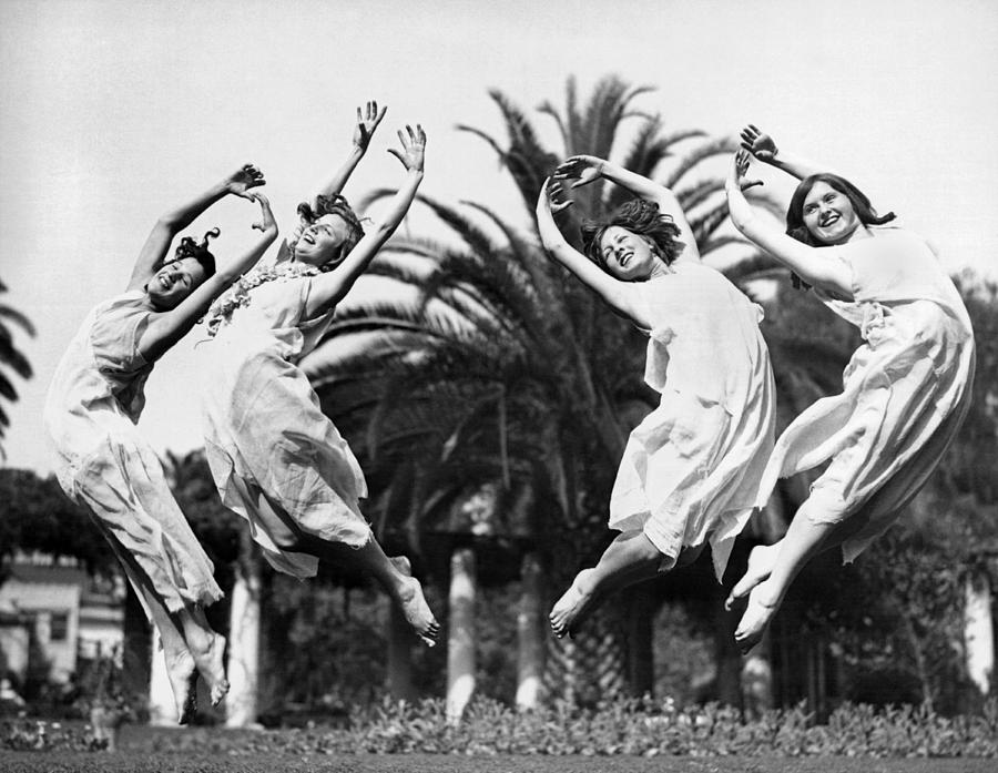 Four Leaping Grecian Dancers Photograph by Underwood Archives