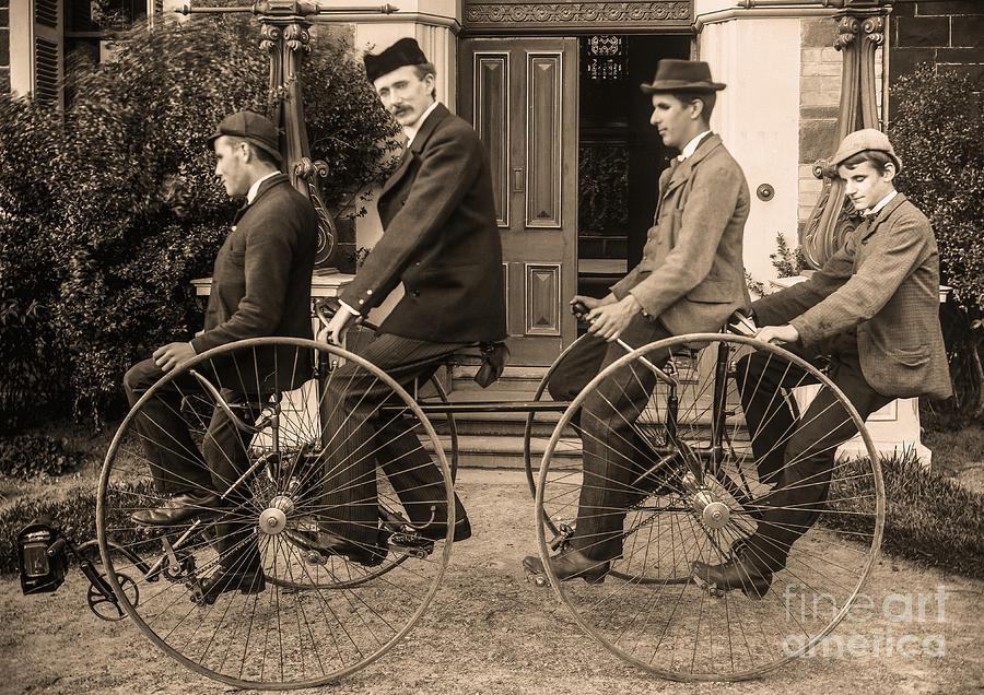 Four men seated on a four wheeled cycle Photograph by Vincent Monozlay