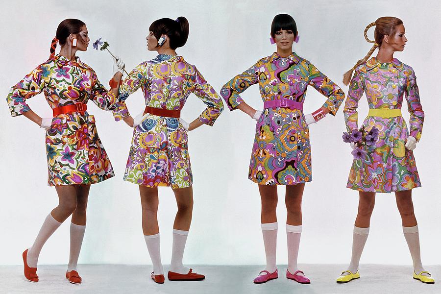Four Models Wearing Colorful Print Dresses Photograph by Gianni Penati
