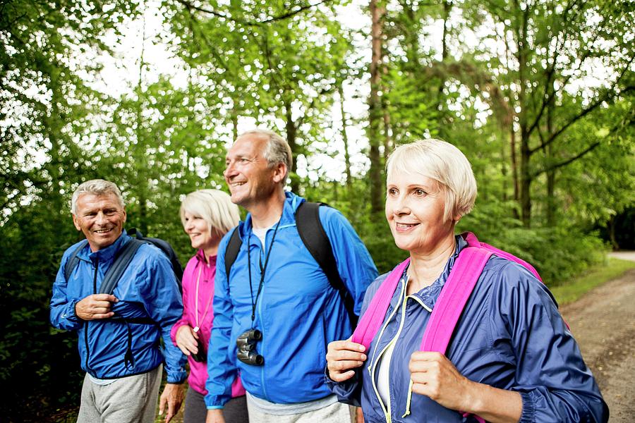 Four People On Hike Photograph by Science Photo Library