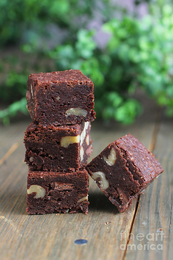 Cake Photograph - Four pieces of brownies by Isabel Poulin