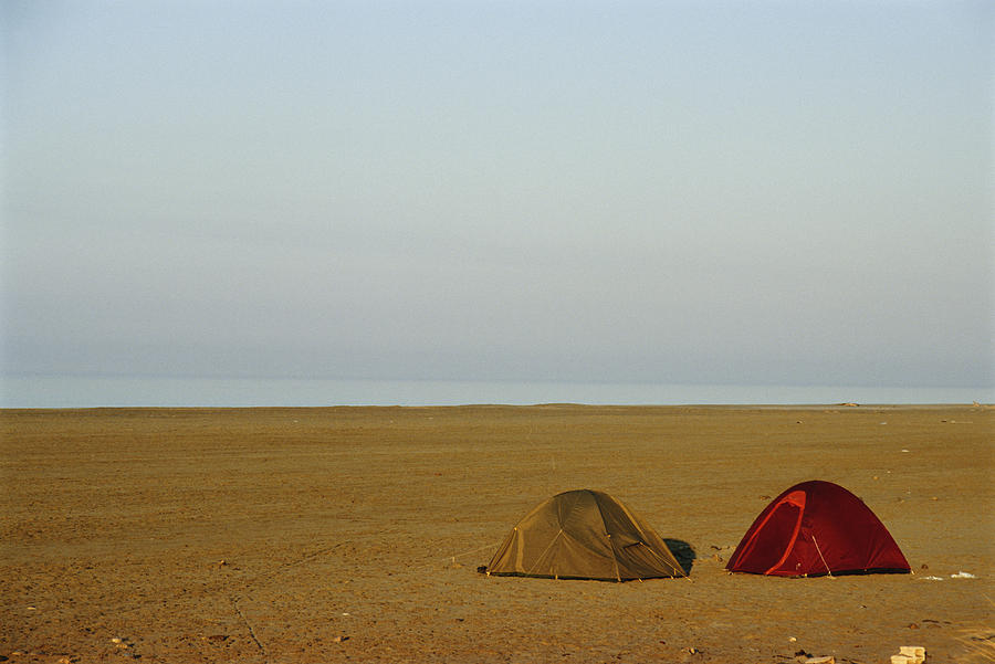 France, Provence, Camargue, two tents on Piemanson beach Photograph by Sami Sarkis