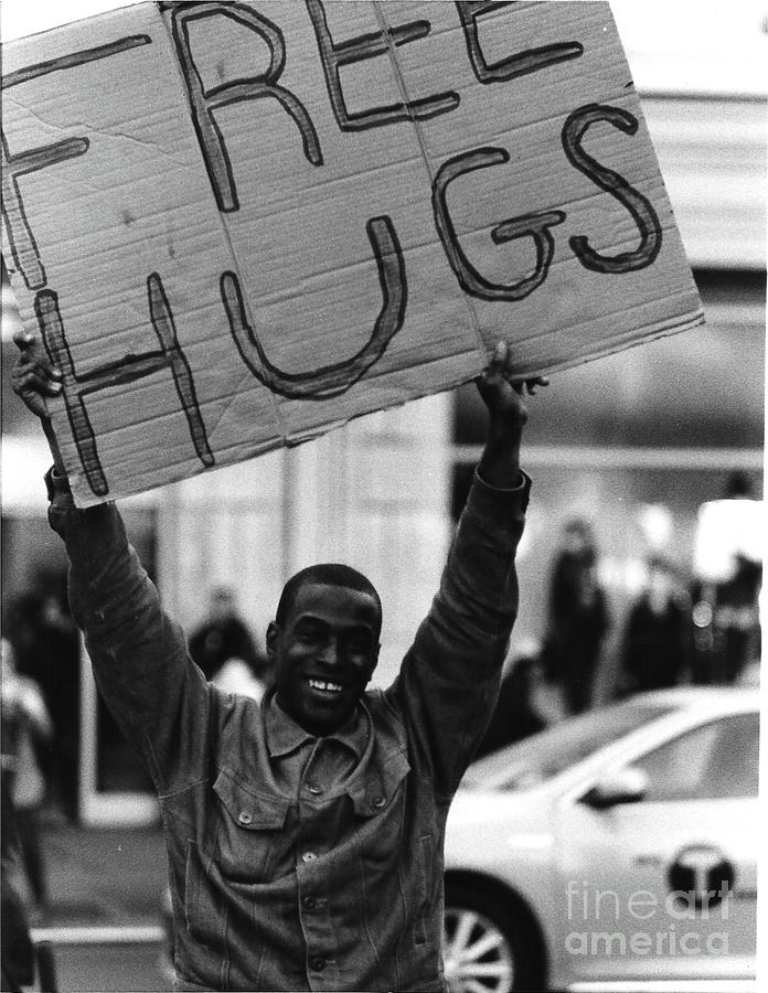 Black And White Photograph - Free Hugs by Kelsey Hopland