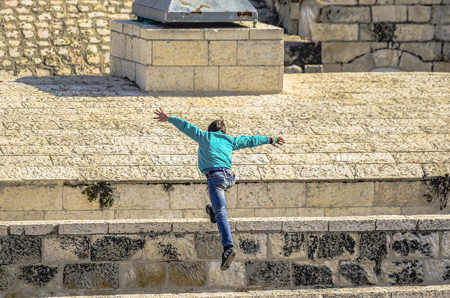 Free Running in Jerusalem Photograph by Alan Marlowe