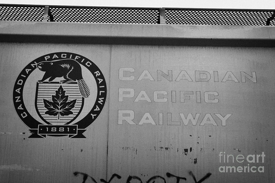 Truck Photograph - freight grain trucks on canadian pacific railway Saskatchewan Canada by Joe Fox